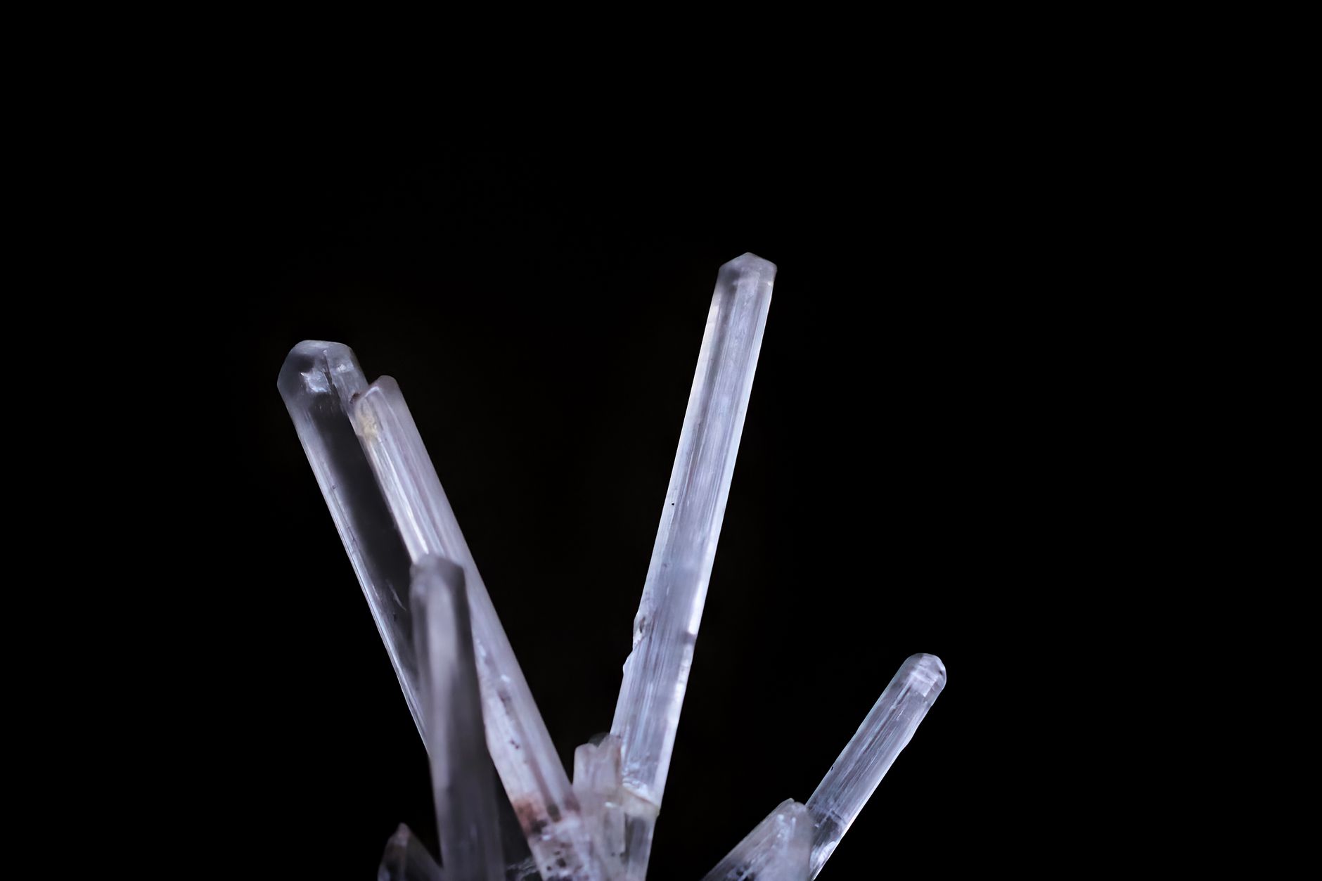 Herkimer diamond quartz crystals sitting on gray dolostone rock