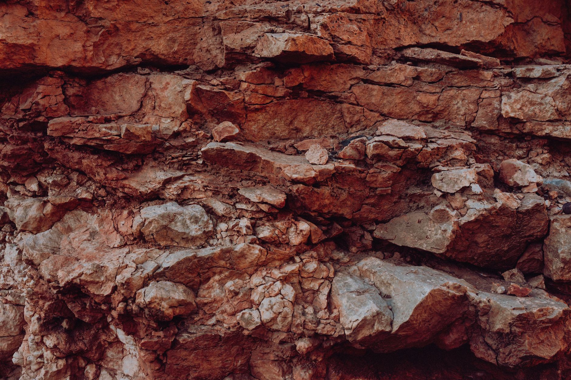Utah desert rhyolite outcrop where topaz crystals weather from vugs